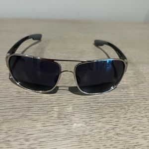 Costa Conch black lenses and arms.  Silver frame